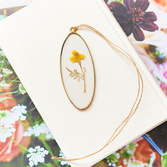 Golden Oval Floral Pendant